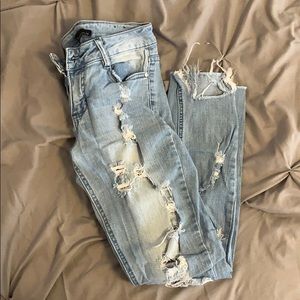 Ripped light washed jeans size 3